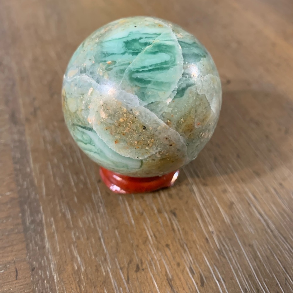 Green calcite sphere with stand